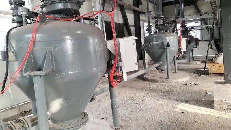 Dense phase bin pump transportation